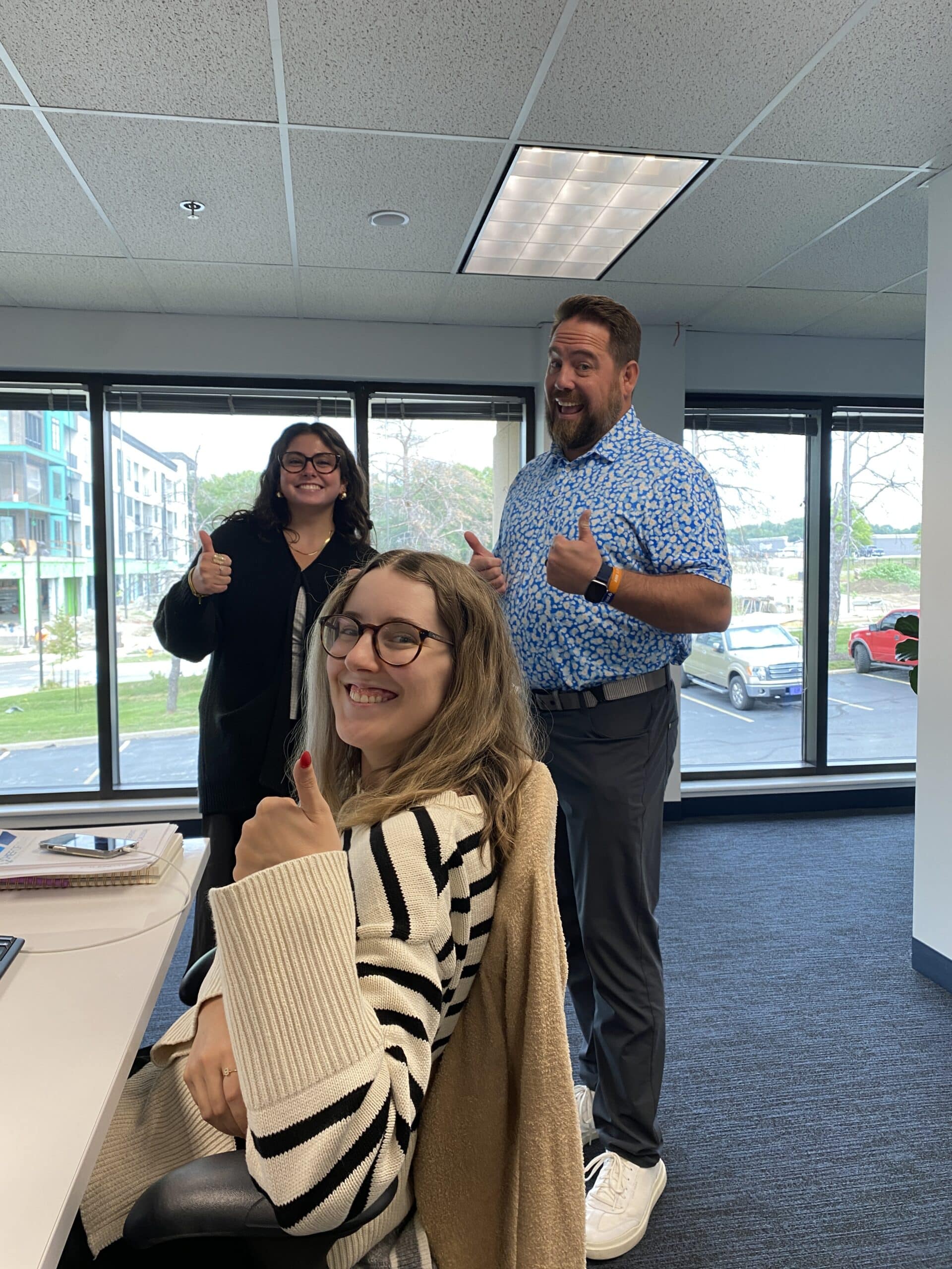 Casey Wright with staff, Briley Walsh and Morgan Kastelan, at the Chief of Staff KC office in Leawood, KS.
